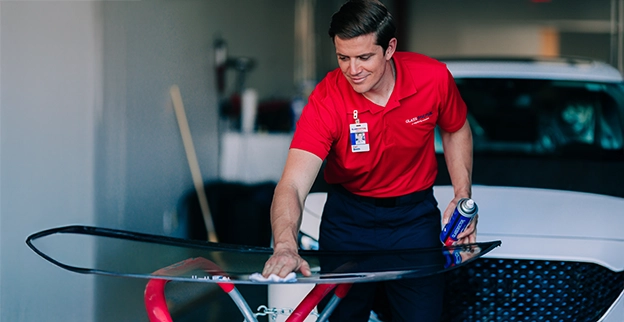 Glass Doctor professional preparing to install a new windshield.
