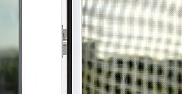 A closeup of a window screen.