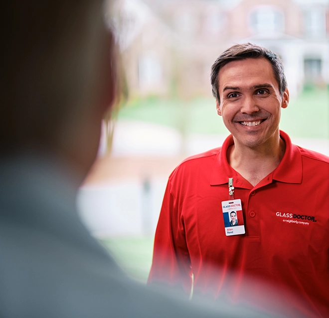 Professional Glass Doctor professional greeting a customer. 