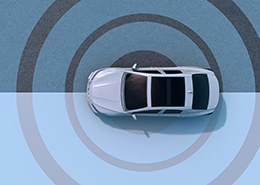 Car on a bullseye showing alignment after adas calibration.